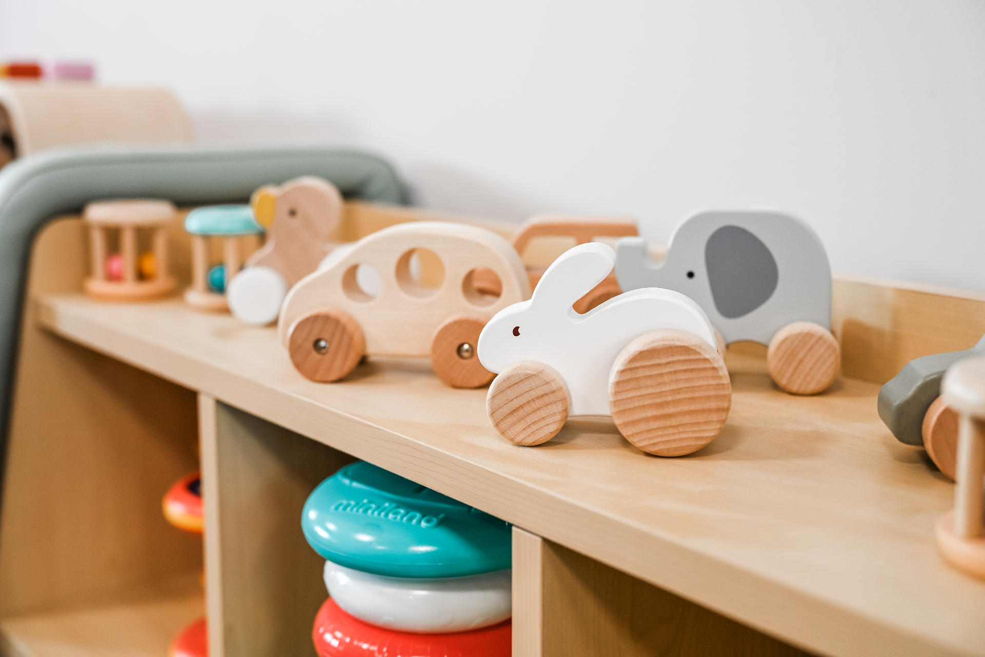 Wooden toys on display in a Mount Low nursery room